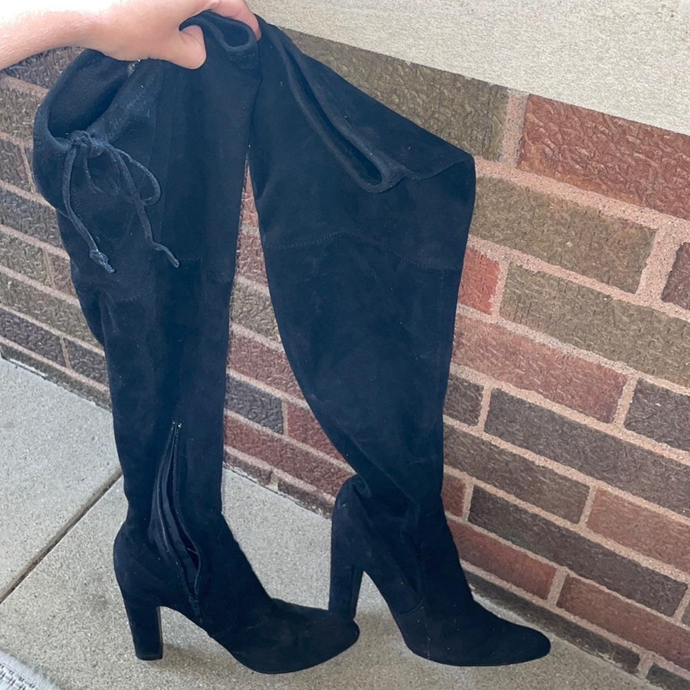 Black thigh high heeled booties